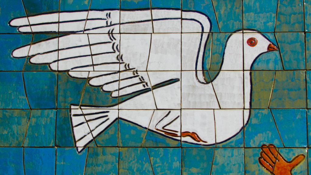 Dove mosaic art representing peacebuilding
