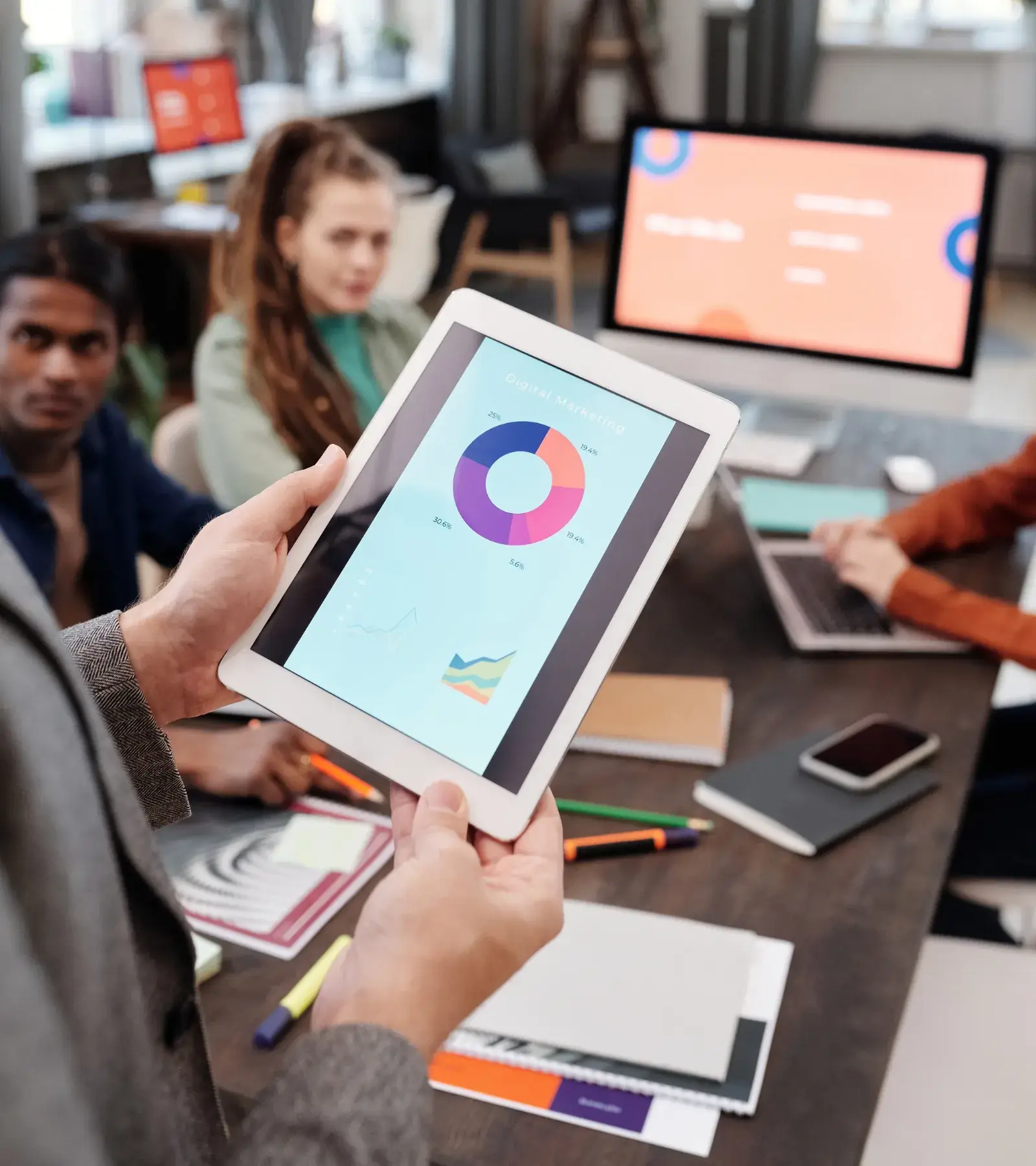 flow chart on ipad screen during a meeting